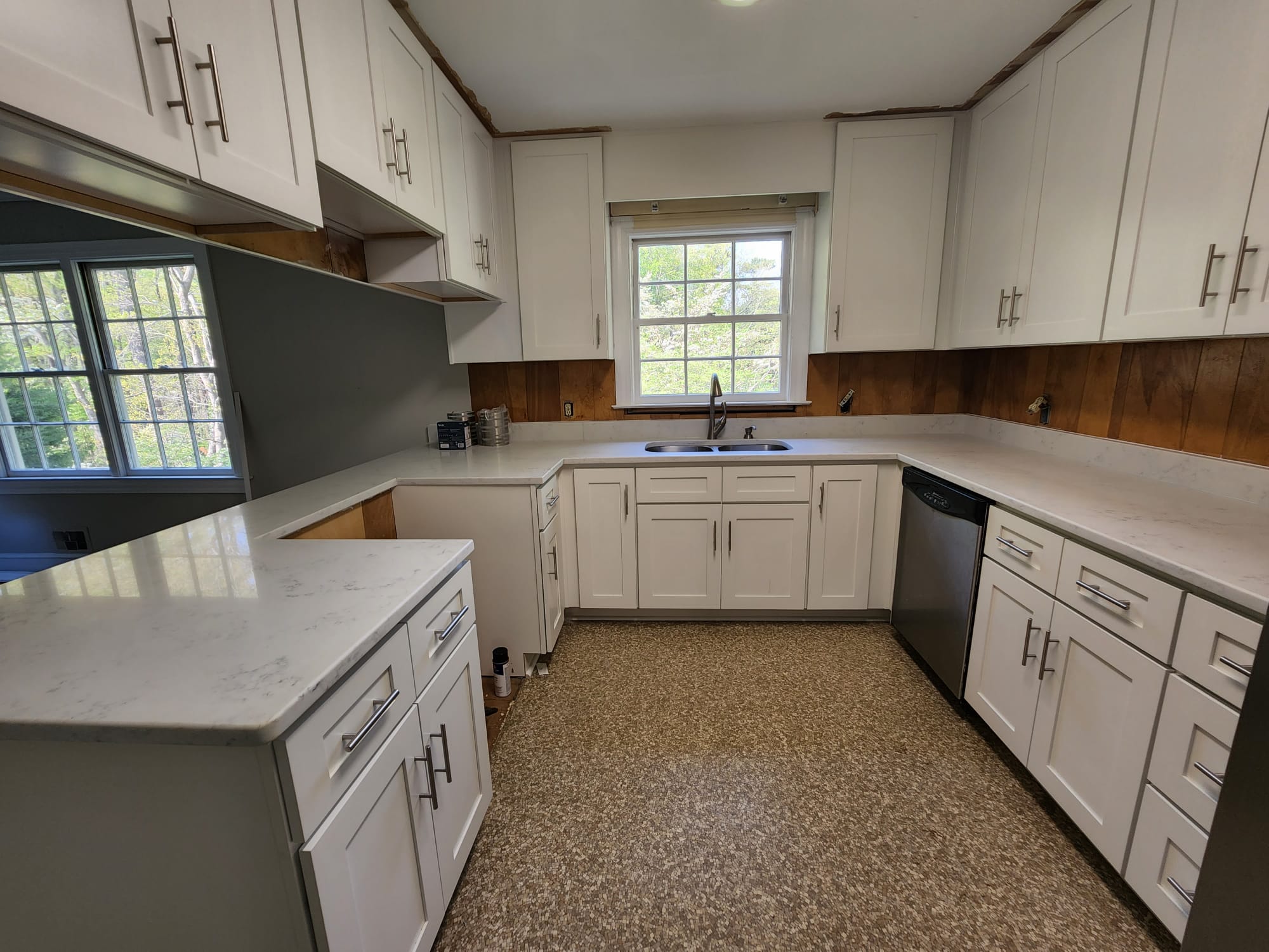 White shaker cabinets with quartz countertops