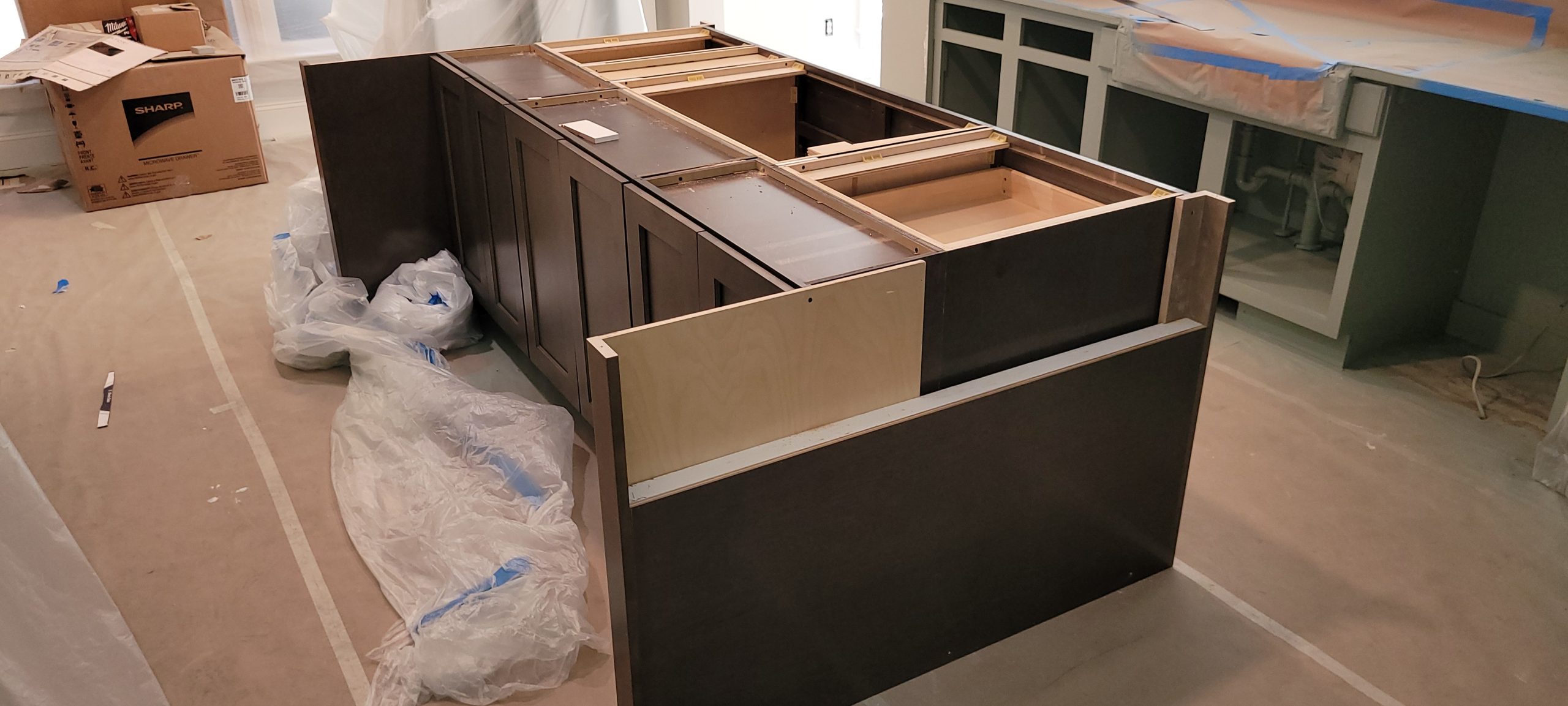 Finished kitchen island and cabinets