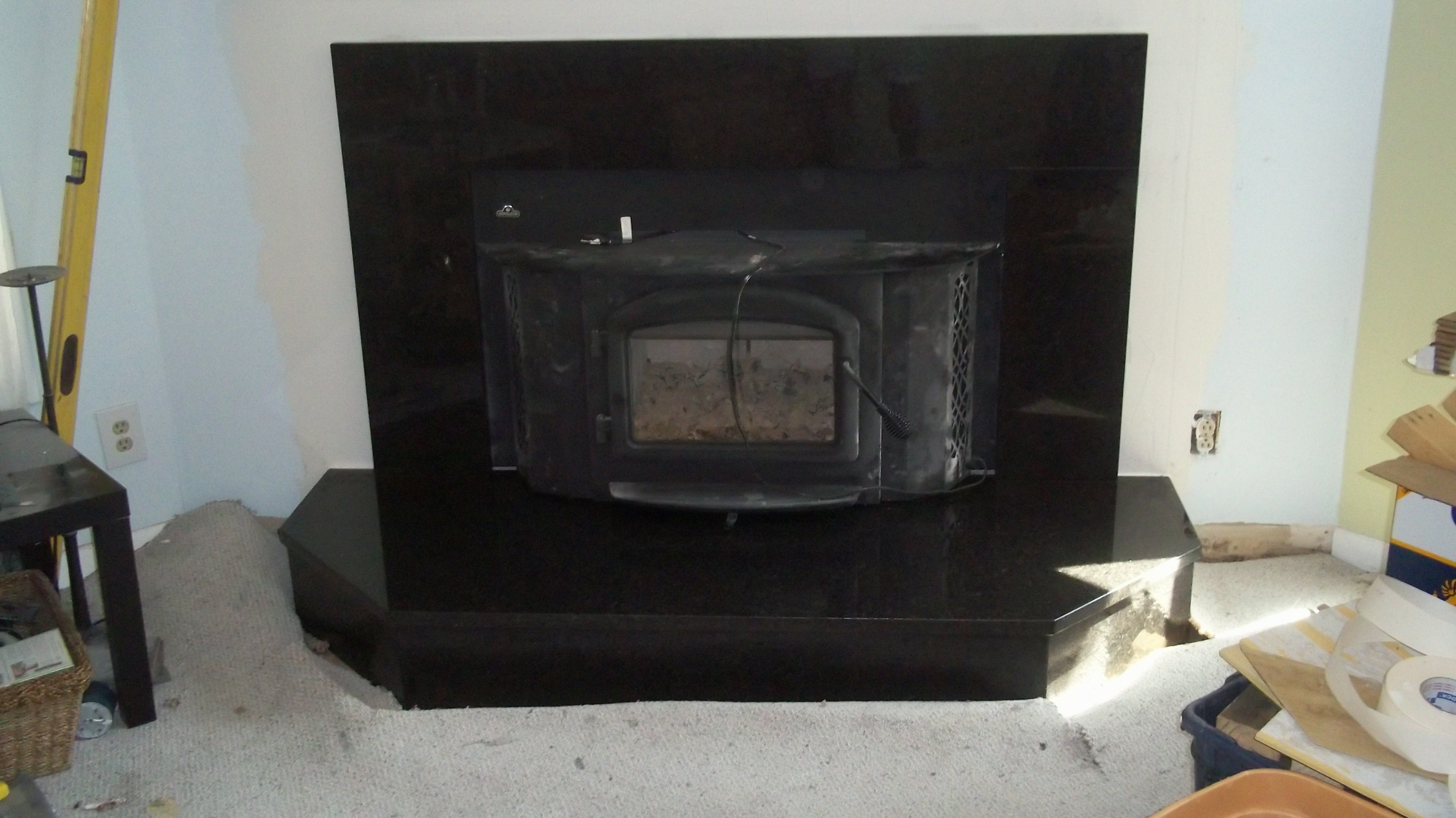 Granite hearth and fireplace surround