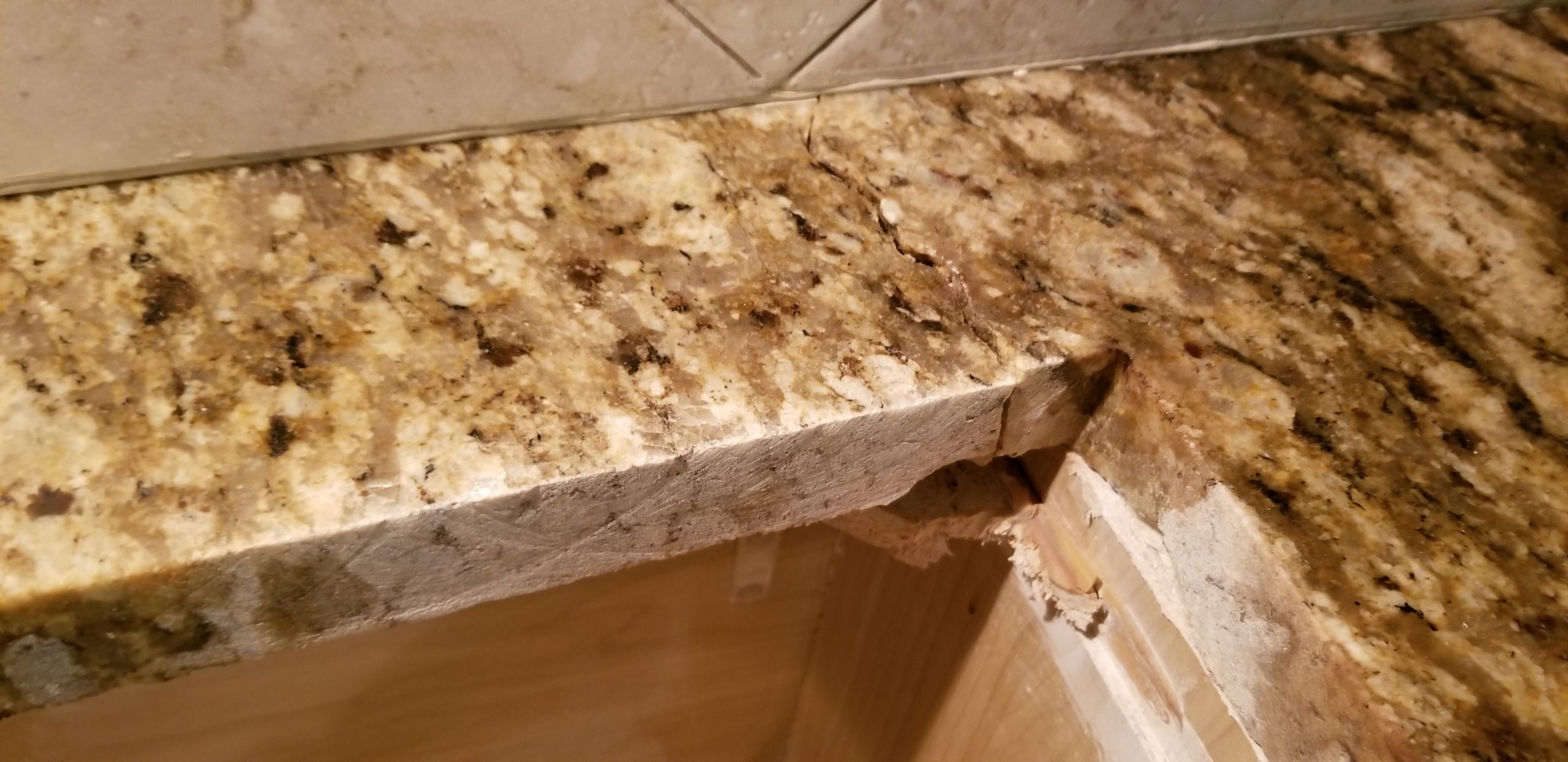 Cooktop crack before repair
